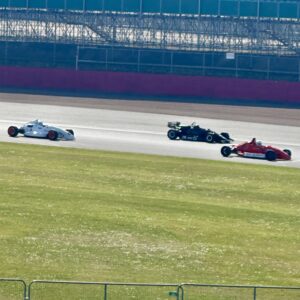 Formula race cars competing at Silverstone circuit representing motorsport performance and endurance racing.